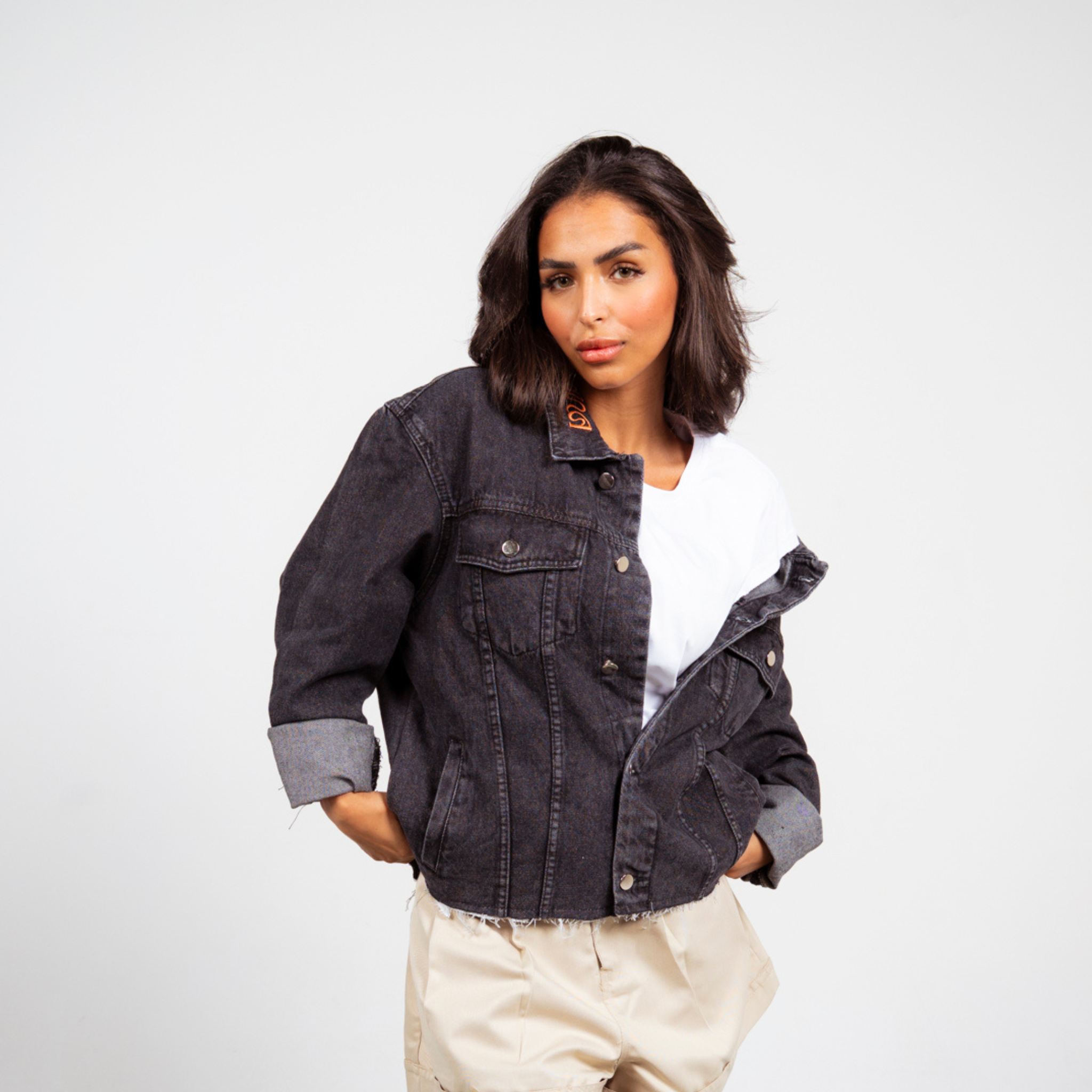 ANA CAI relaxed fit denim jacket in 100% rigid cotton with dropped shoulders and hip-length silhouette
