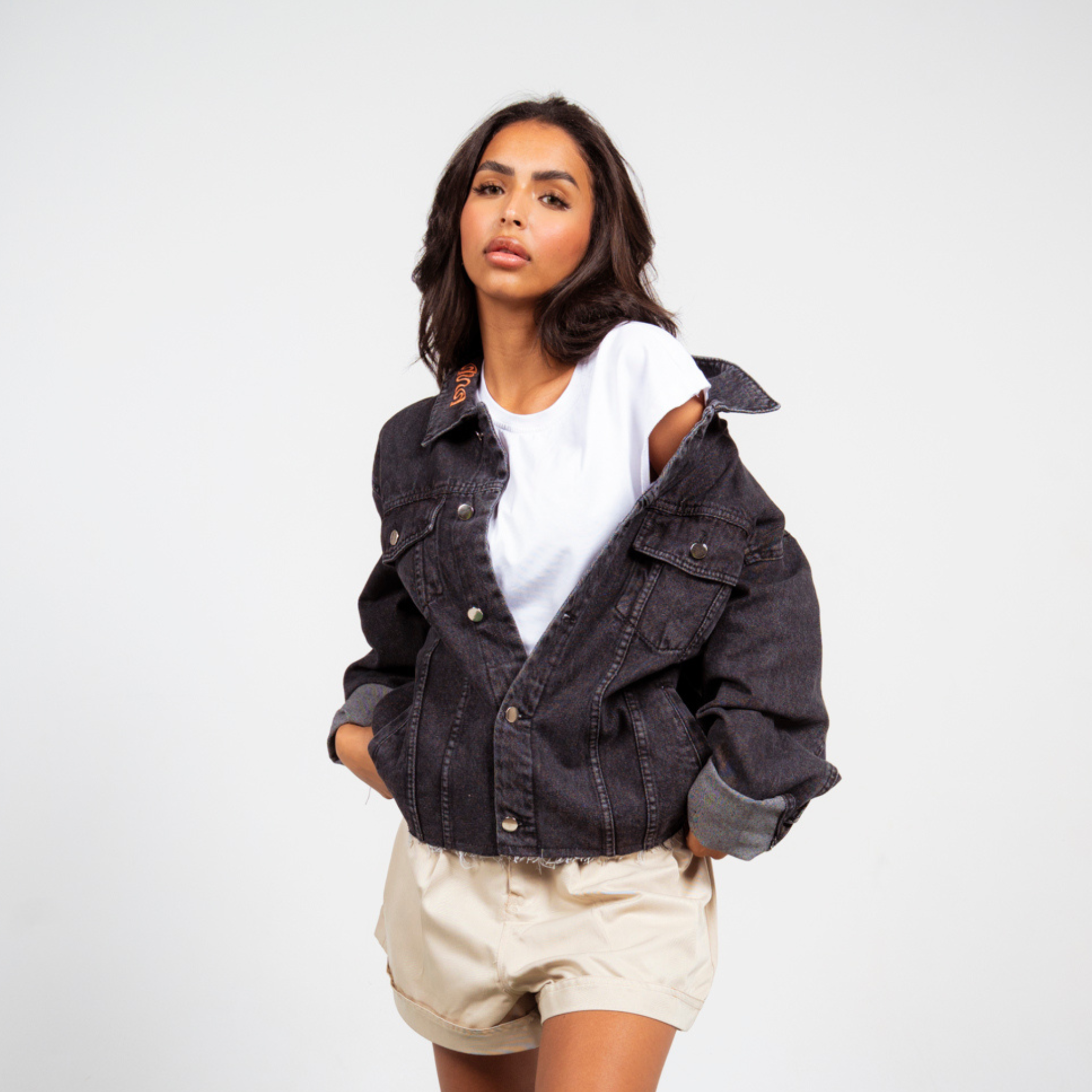 ANA CAI relaxed fit denim jacket in 100% rigid cotton with dropped shoulders and hip-length silhouette