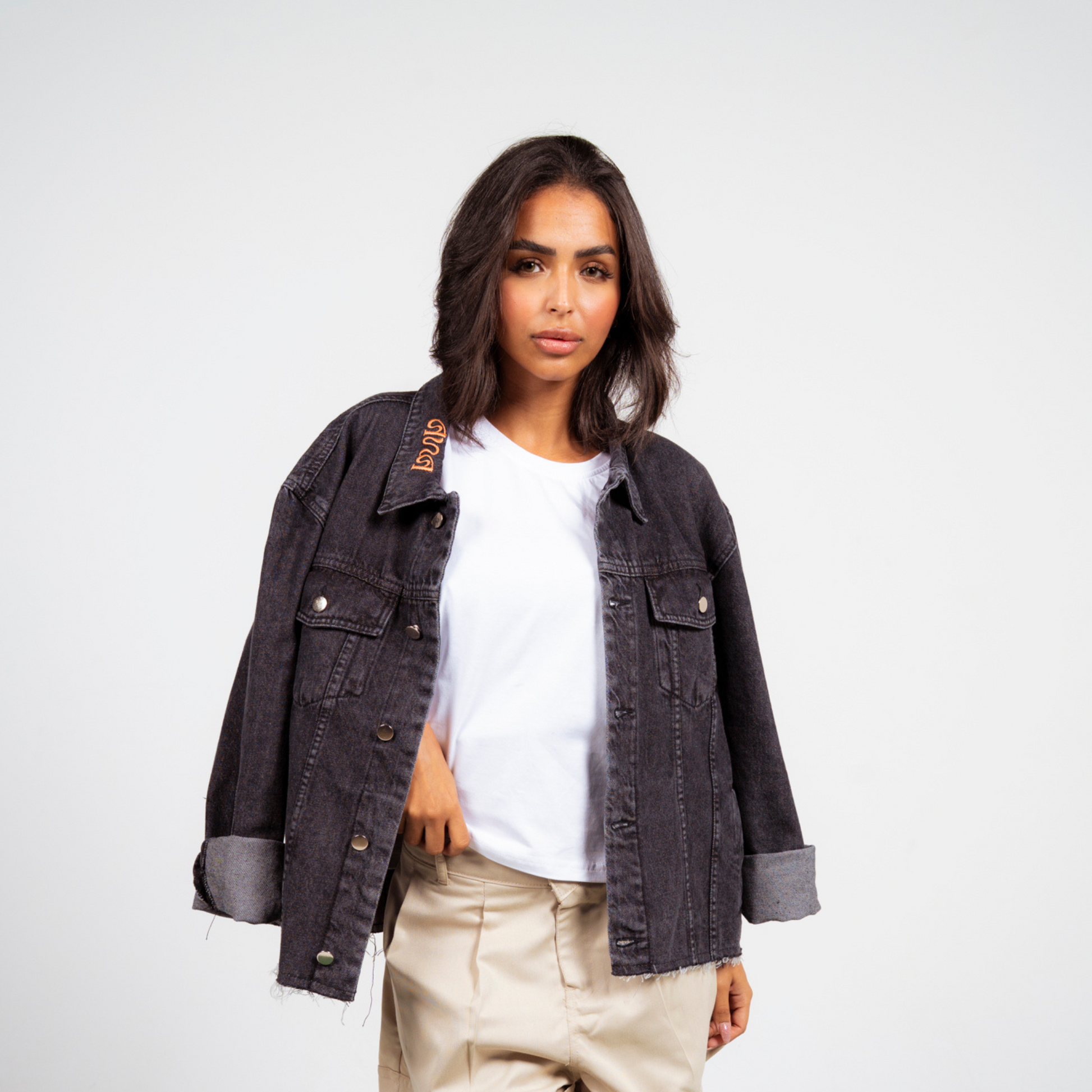 ANA CAI relaxed fit denim jacket in 100% rigid cotton with dropped shoulders and hip-length silhouette