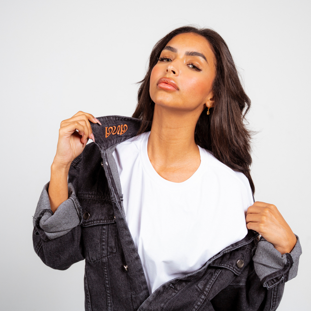 ANA CAI relaxed fit denim jacket in 100% rigid cotton with dropped shoulders and hip-length silhouette