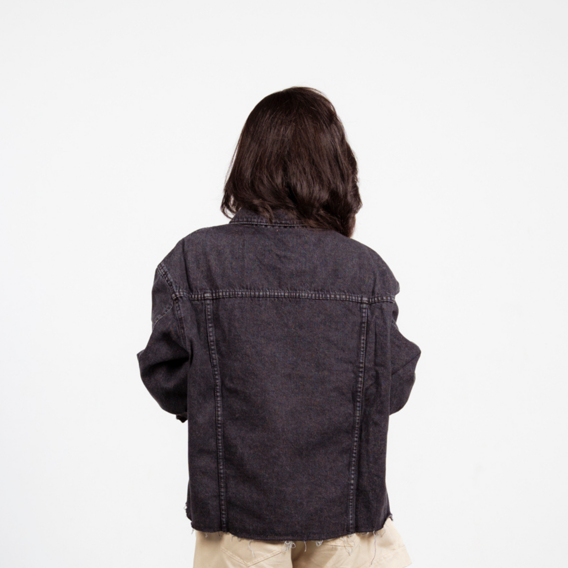ANA CAI relaxed fit denim jacket in 100% rigid cotton with dropped shoulders and hip-length silhouette
