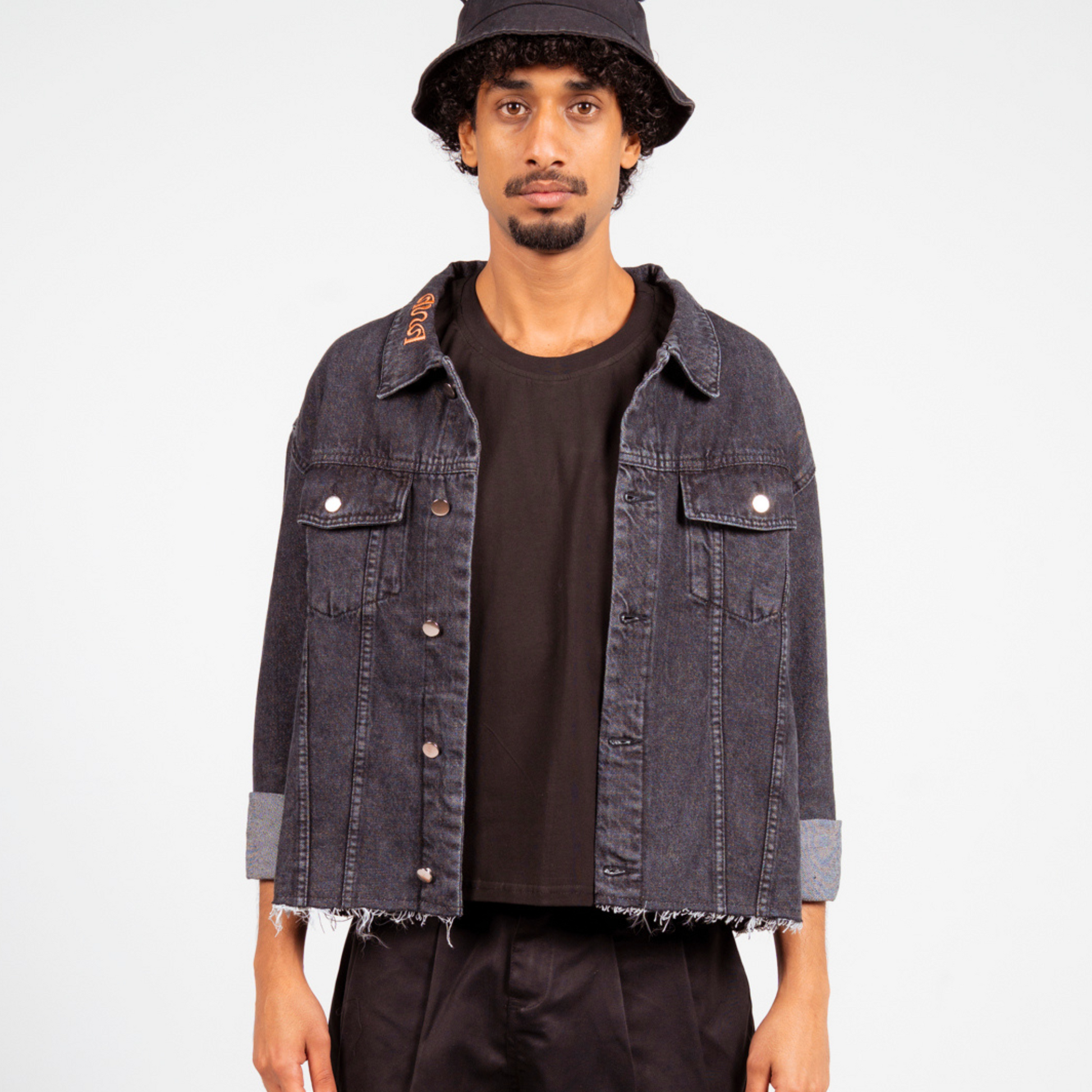 ANA CAI relaxed fit denim jacket in 100% rigid cotton with dropped shoulders and hip-length silhouette