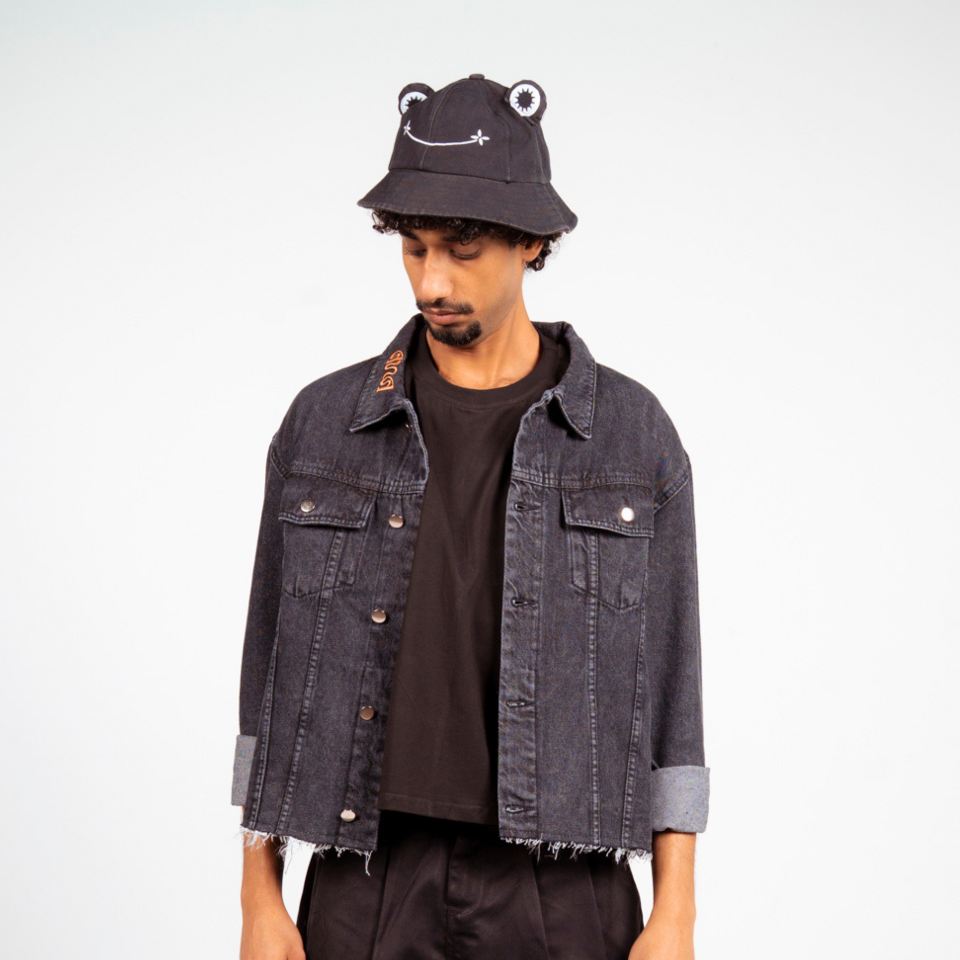 ANA CAI relaxed fit denim jacket in 100% rigid cotton with dropped shoulders and hip-length silhouette