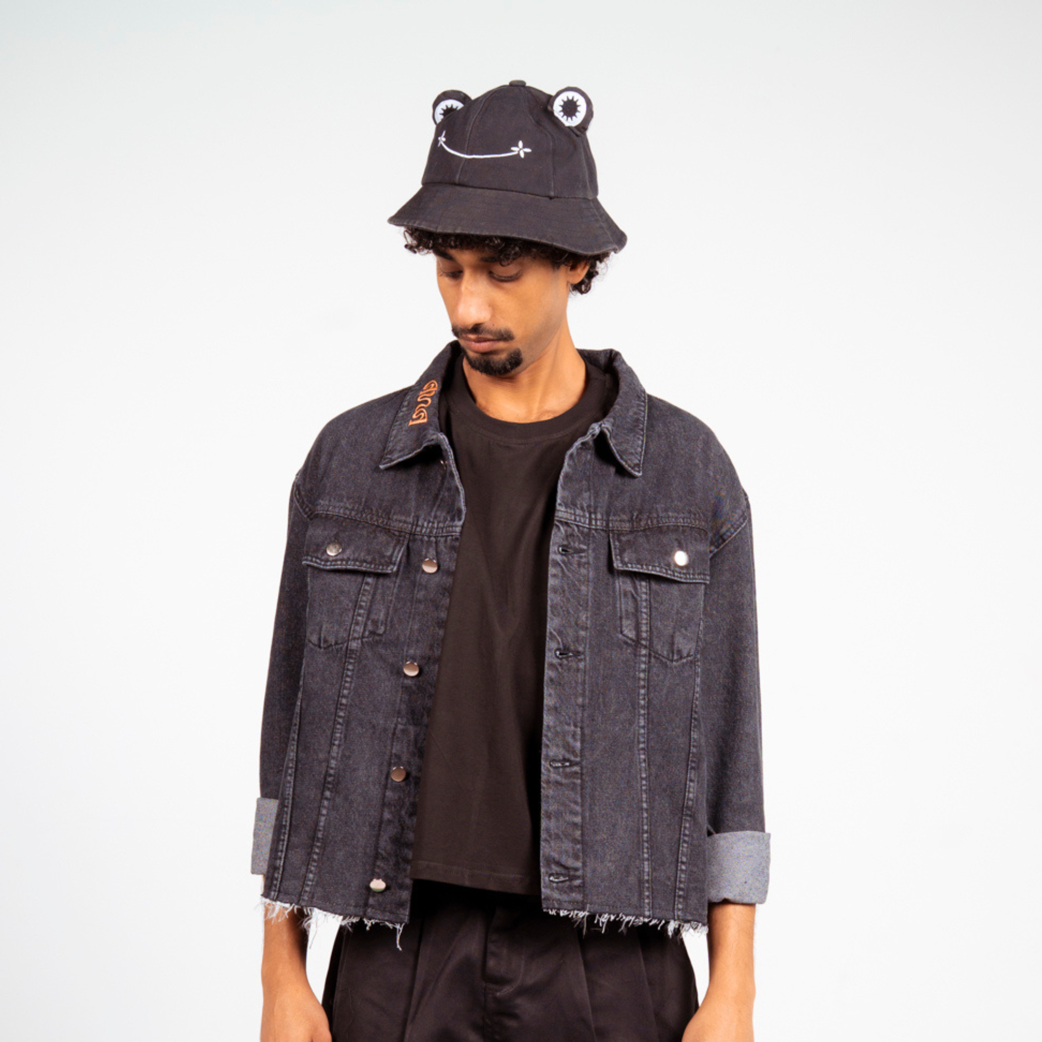 ANA CAI relaxed fit denim jacket in 100% rigid cotton with dropped shoulders and hip-length silhouette