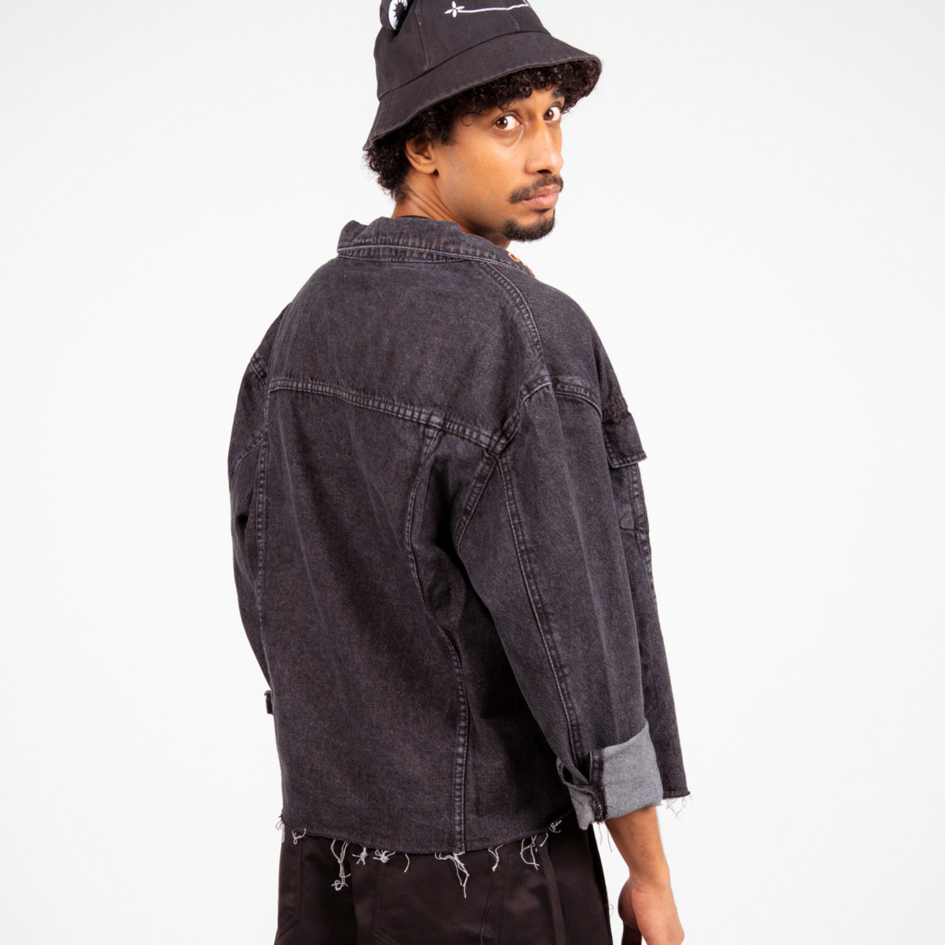 ANA CAI relaxed fit denim jacket in 100% rigid cotton with dropped shoulders and hip-length silhouette