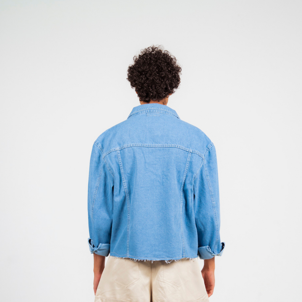 ANA CAI oversized unisex denim jacket in 100% cotton with dropped shoulders, relaxed fit, and classic indigo wash
