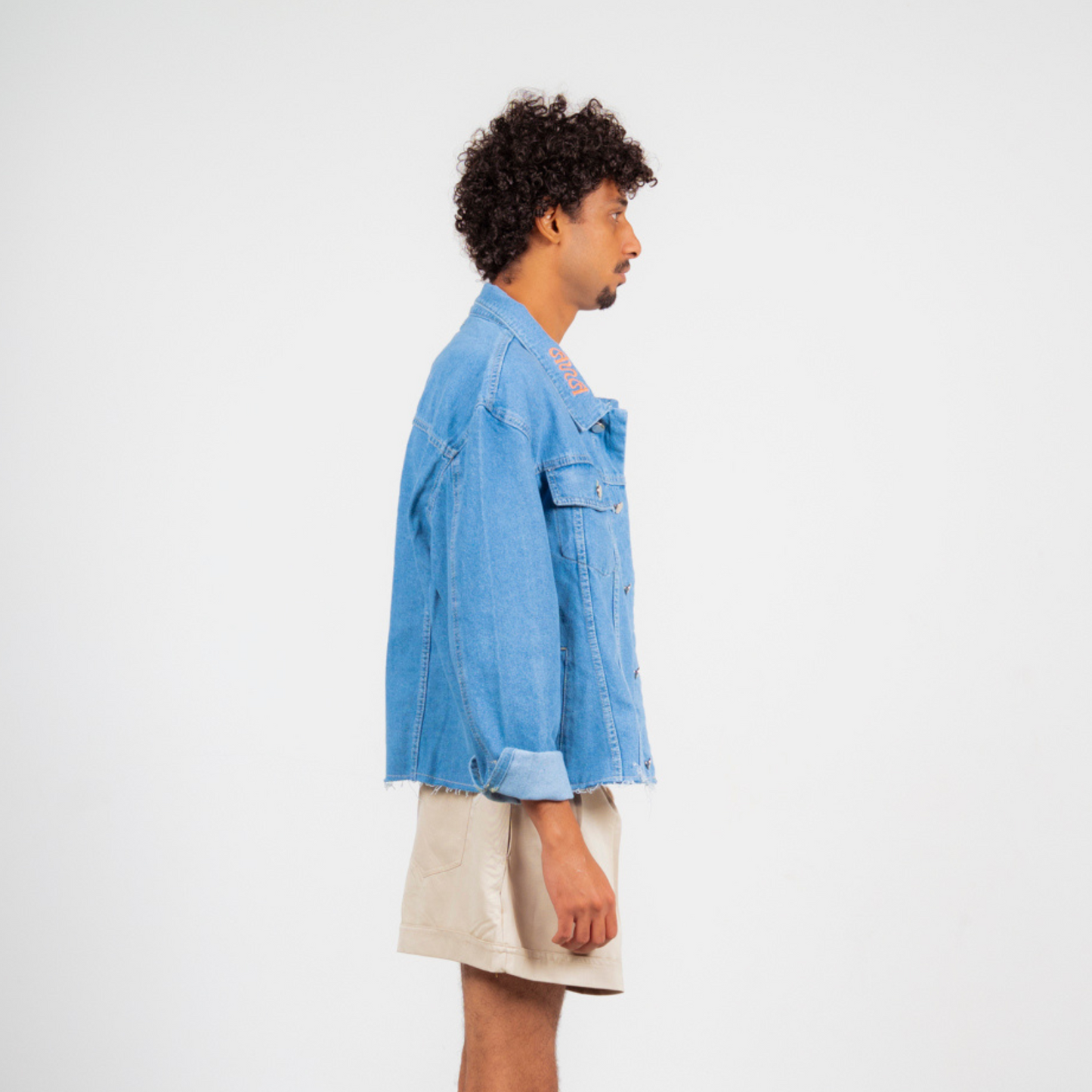 ANA CAI oversized unisex denim jacket in 100% cotton with dropped shoulders, relaxed fit, and classic indigo wash