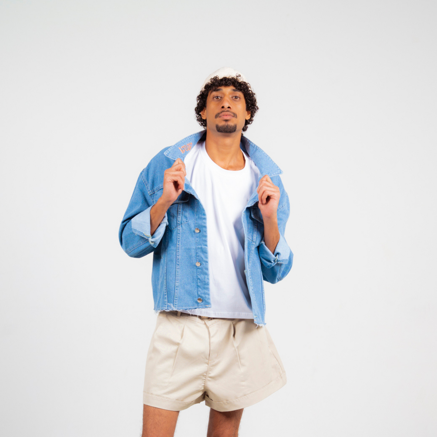 ANA CAI oversized unisex denim jacket in 100% cotton with dropped shoulders, relaxed fit, and classic indigo wash