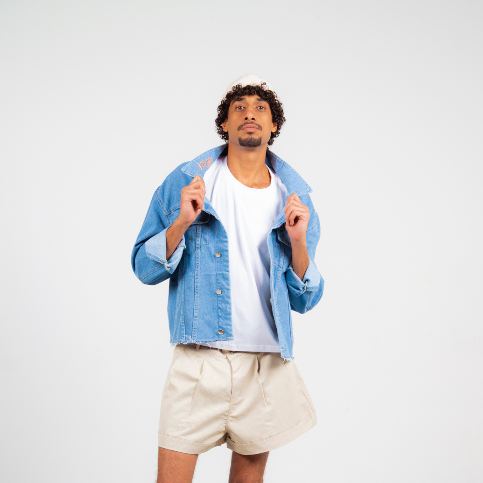 ANA CAI oversized unisex denim jacket in 100% cotton with dropped shoulders, relaxed fit, and classic indigo wash