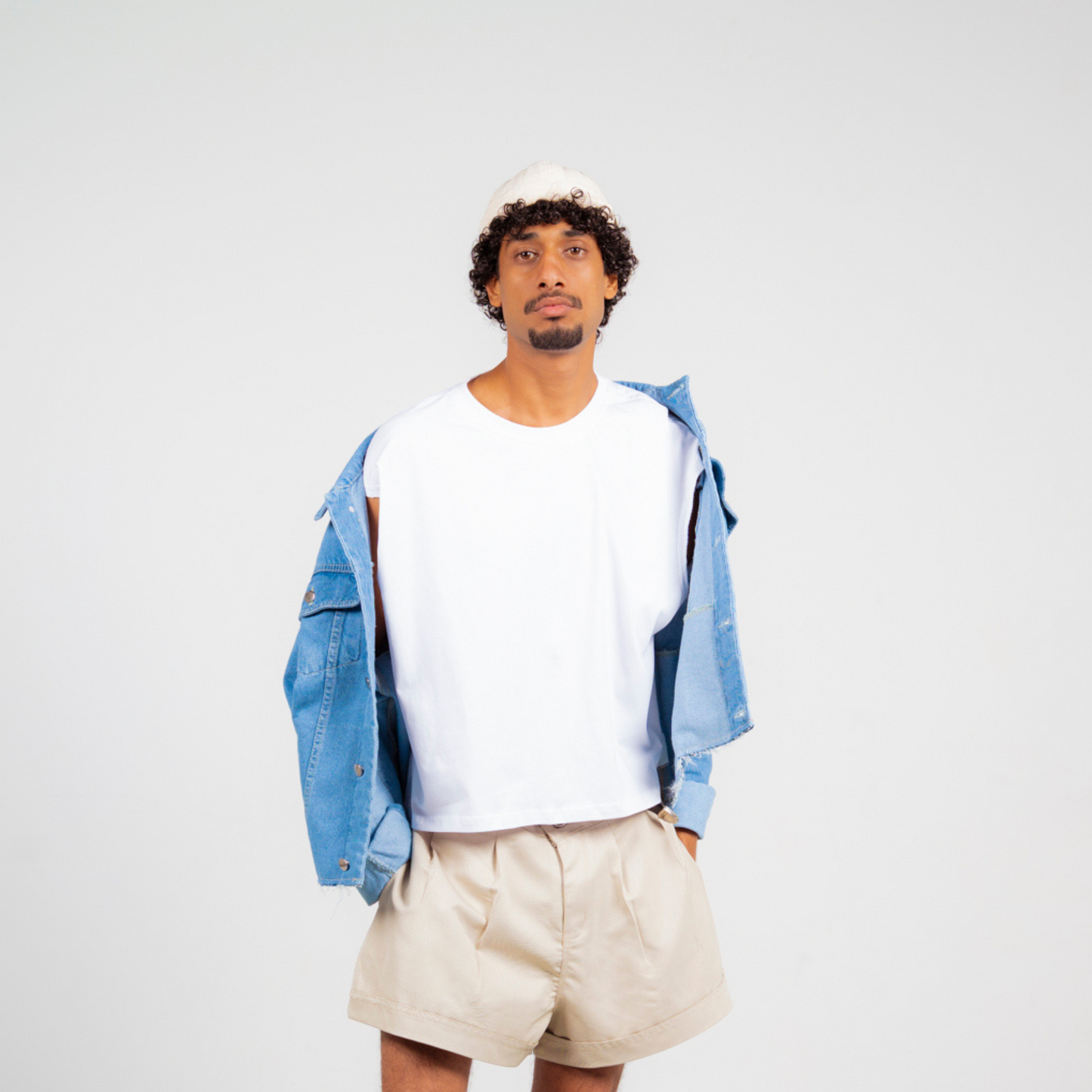 ANA CAI oversized unisex denim jacket in 100% cotton with dropped shoulders, relaxed fit, and classic indigo wash