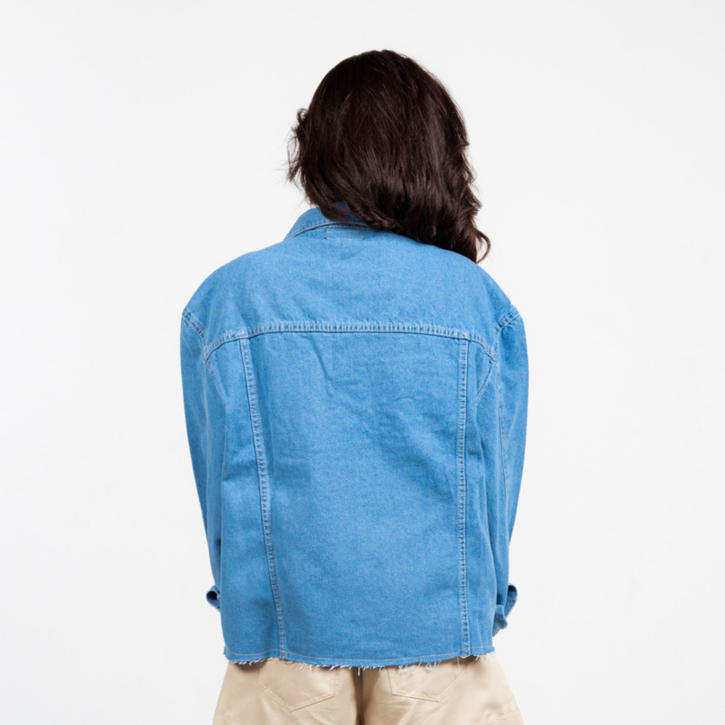 ANA CAI oversized unisex denim jacket in 100% cotton with dropped shoulders, relaxed fit, and classic indigo wash