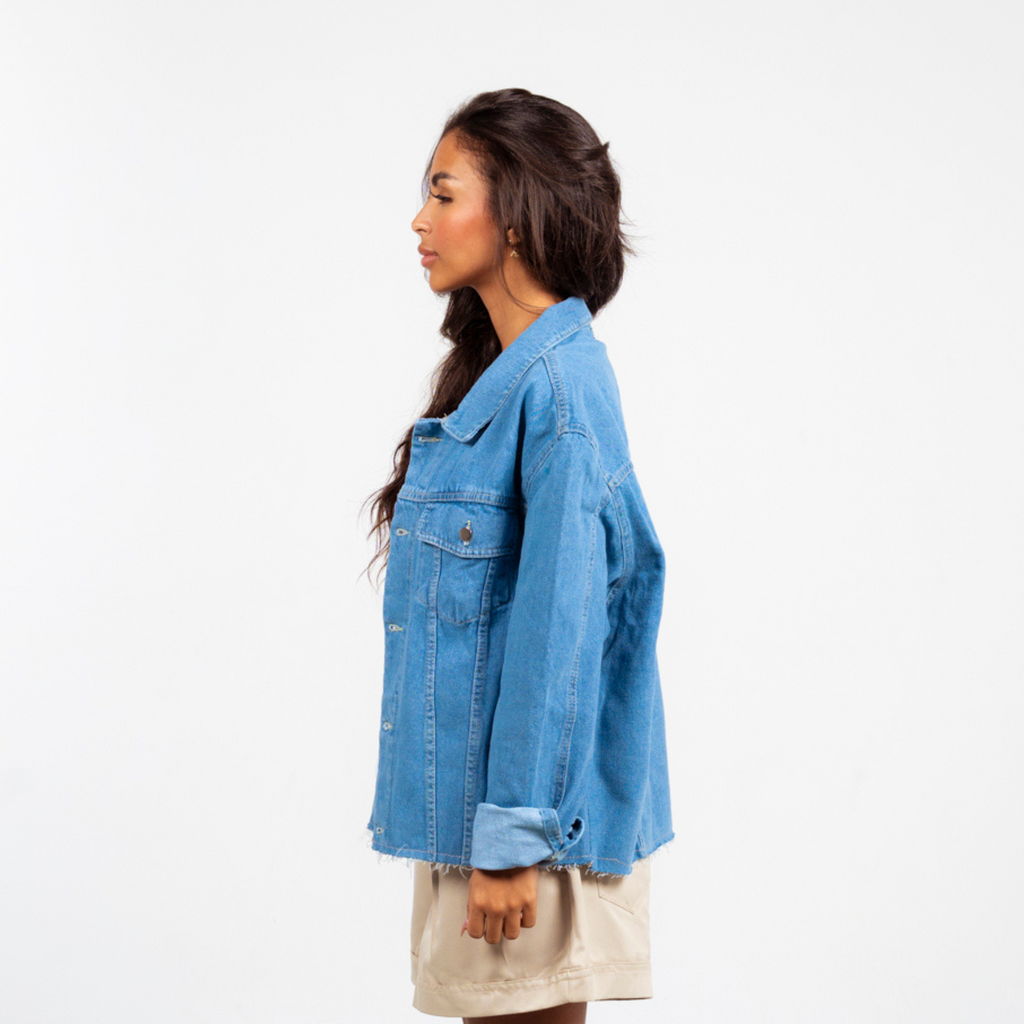 ANA CAI oversized unisex denim jacket in 100% cotton with dropped shoulders, relaxed fit, and classic indigo wash