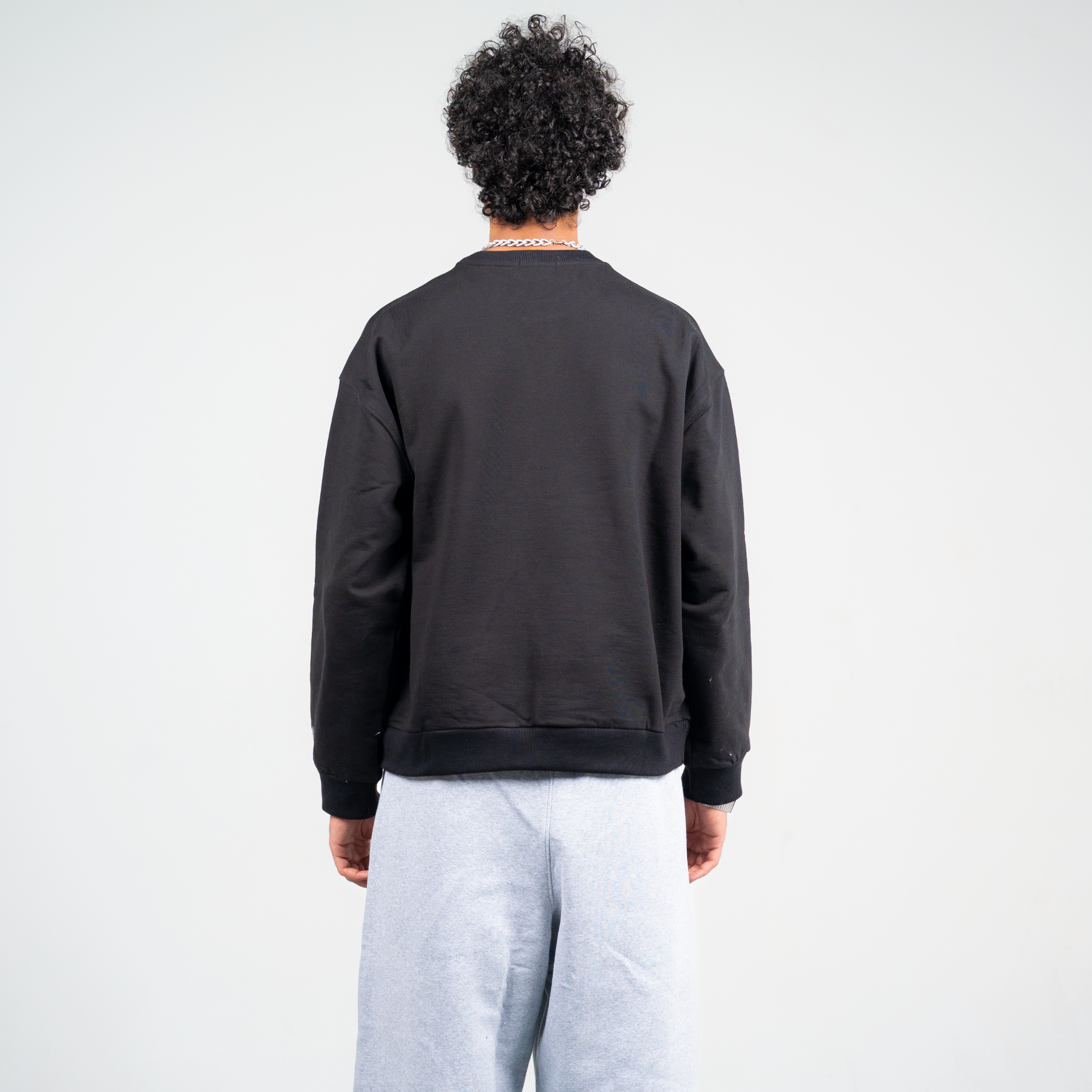 ANA CAI Unique Minds embroidered crewneck in 100% cotton with boxy fit and ribbed crew neckline